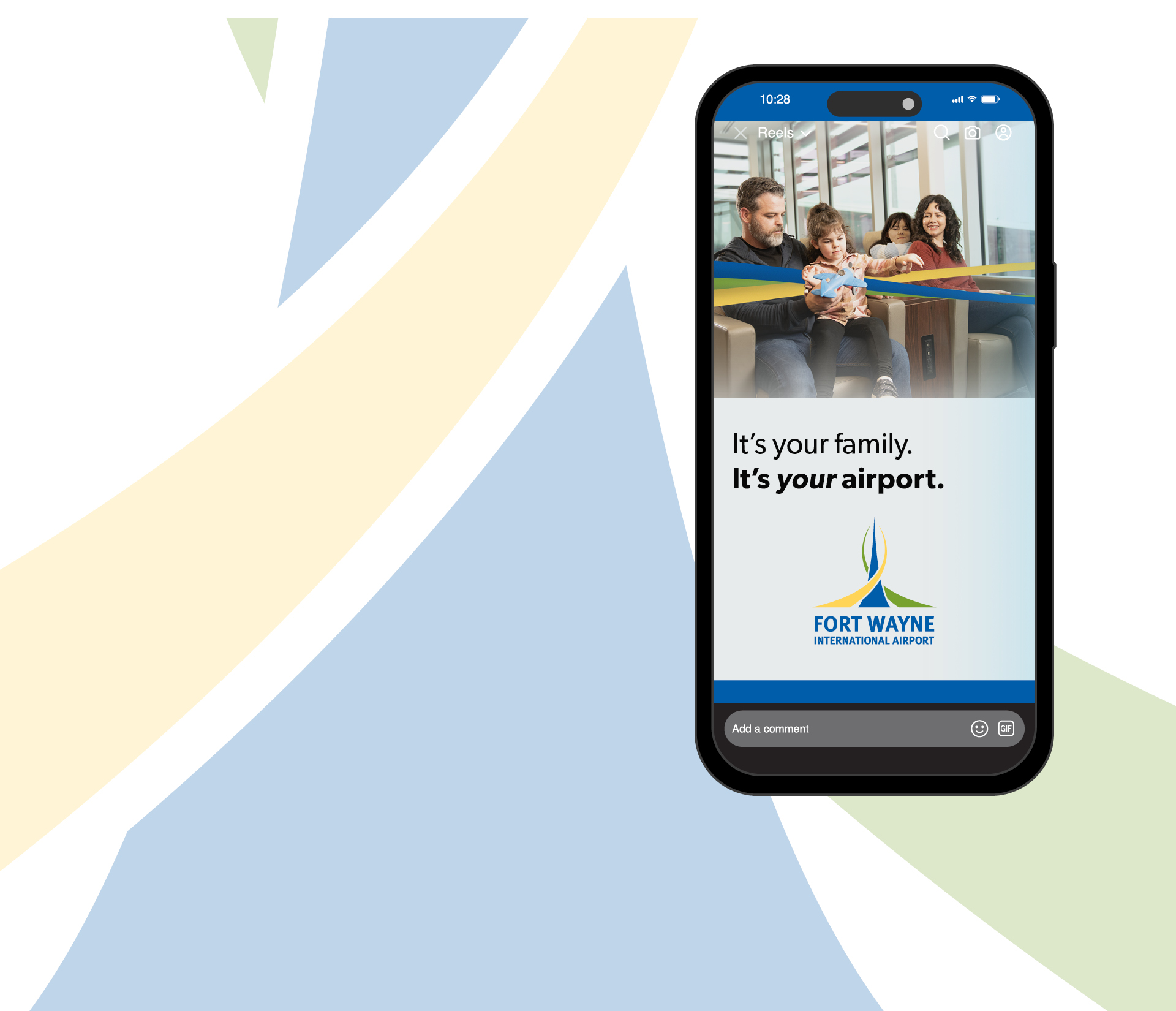 Smartphone screen displaying a Fort Wayne International Airport promo reel with a smiling family seated in an airport lounge and the slogan 'It’s your family. It’s your airport.'